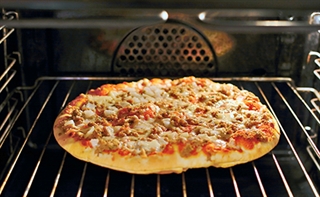frozen pizza in the oven